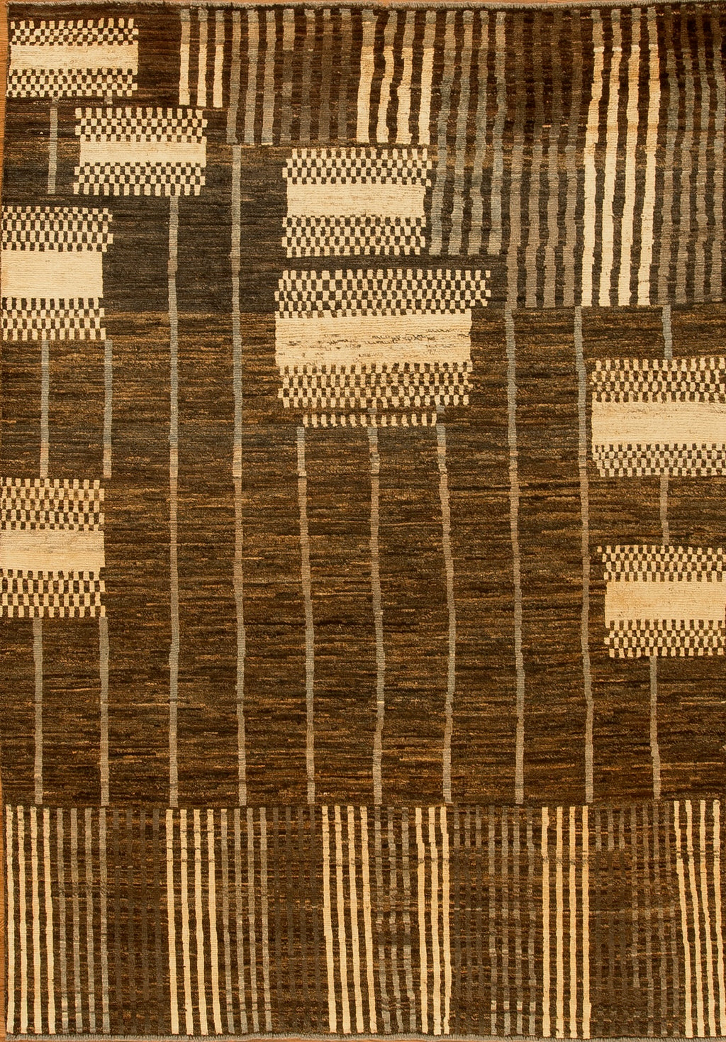 Brown and beige patterned rug with geometric design