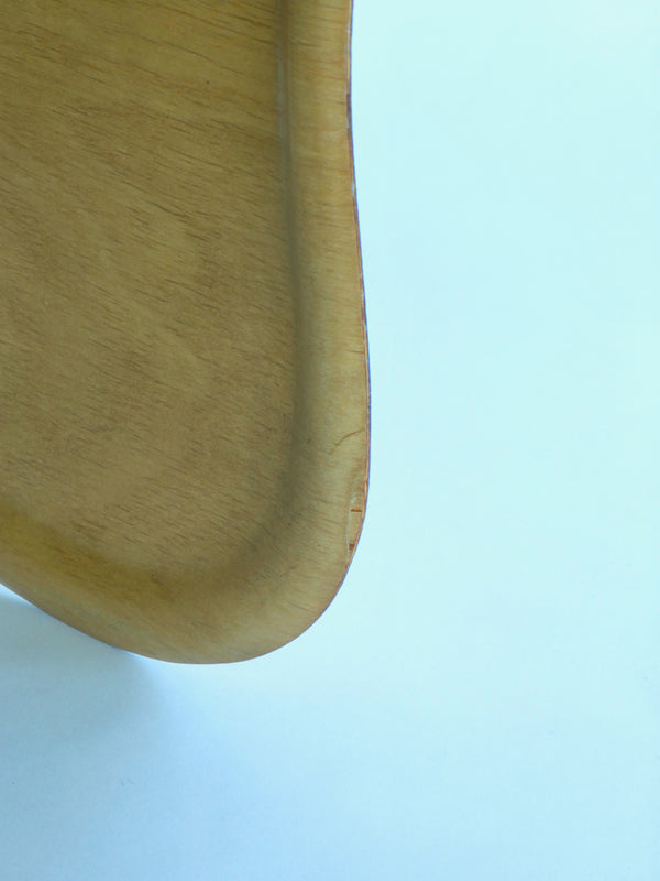 Wooden tray with small defect