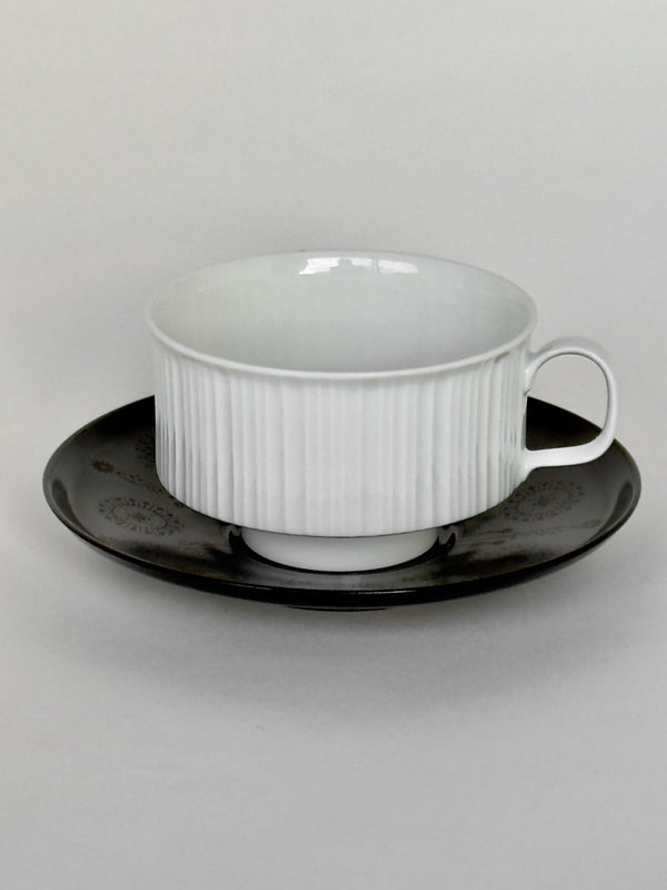 White ceramic cup and saucer 