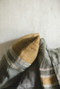 Textured fabric with striped pattern on a neutral background