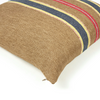 Textured pillow with striped pattern on a white background