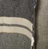 Close-up of a textured linen fabric with a striped pattern