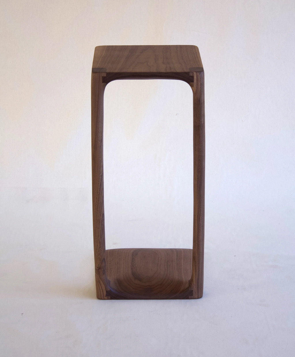 Wooden stool on a white background