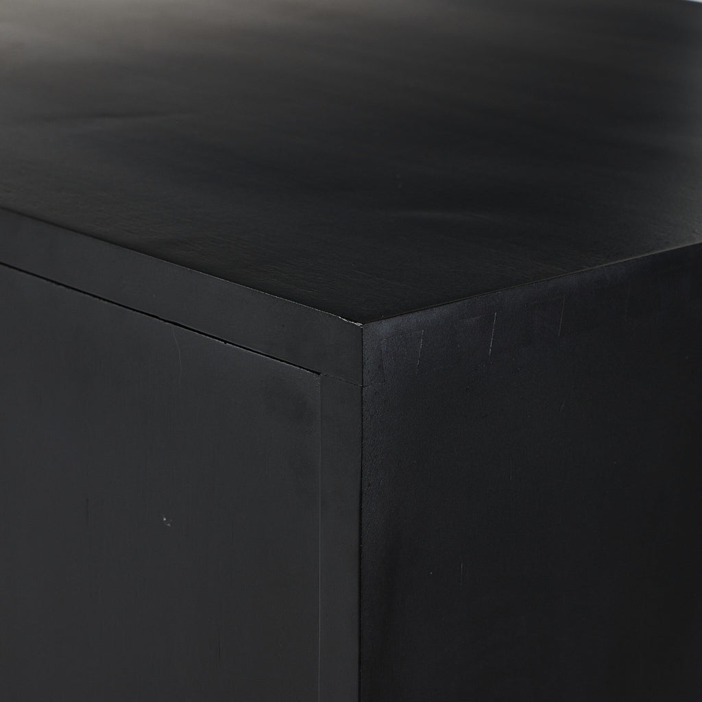 Close-up of a black wood surface with a smooth texture