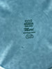 Close-up of a textured surface with 'Arabia Finland Meri' branding.