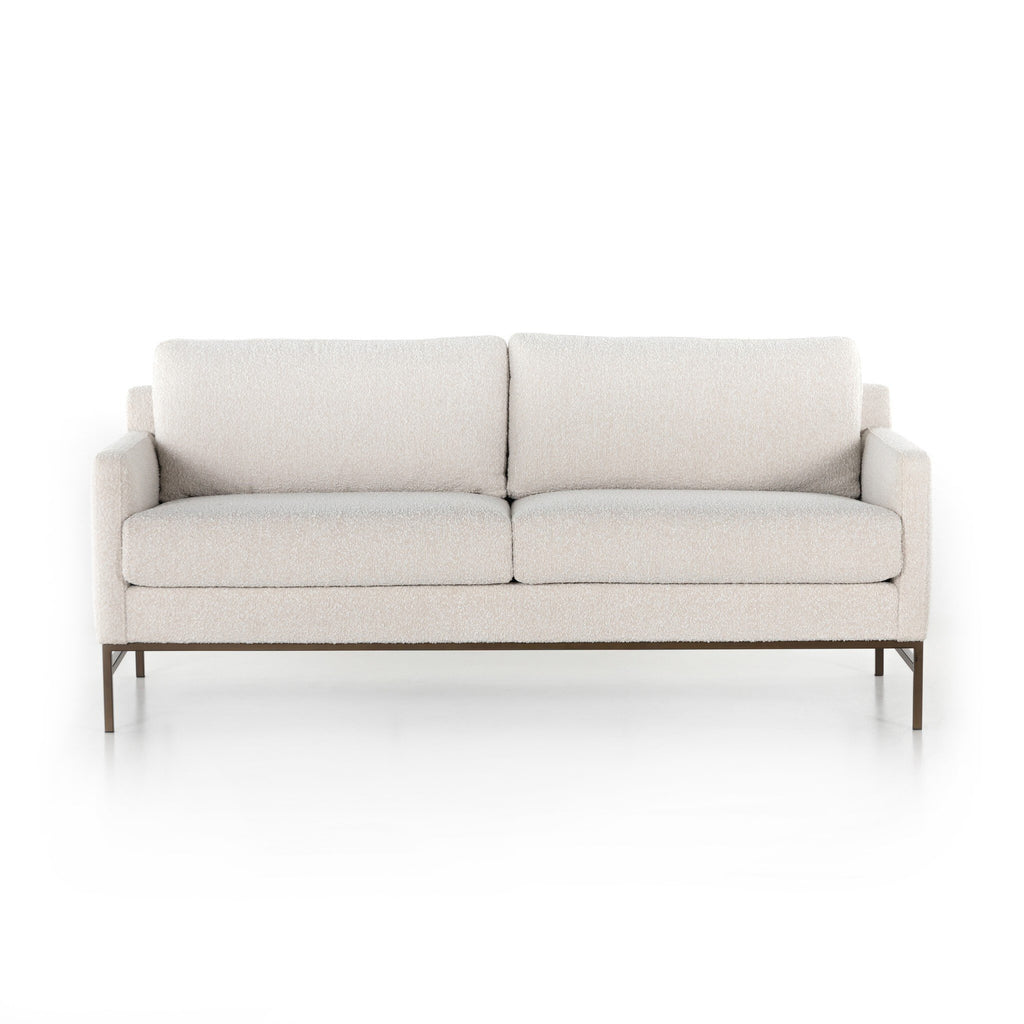 Beige sofa on a white background
