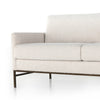 Light gray sofa with a textured fabric on a white background