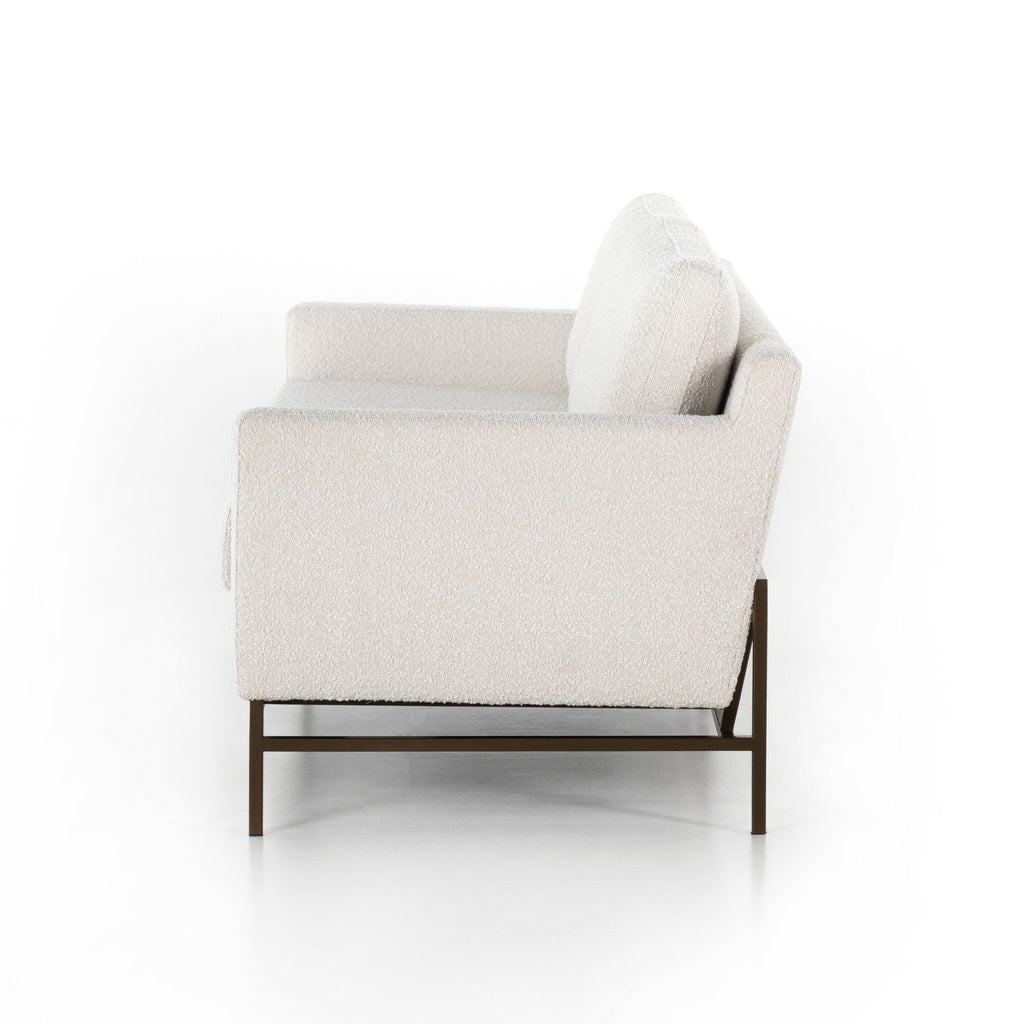 Modern armchair with a white cushion on a white background