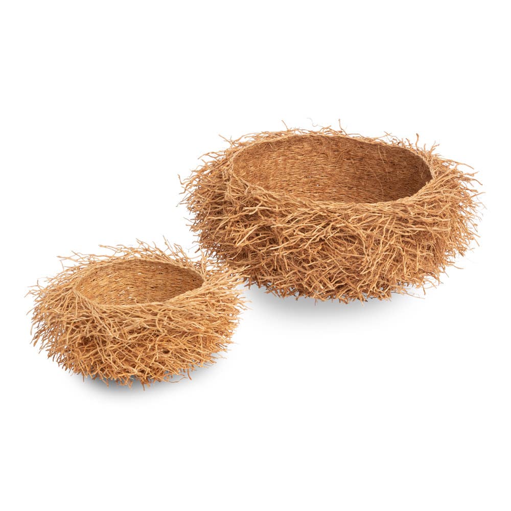 Two natural coiled rattan vetiver nest shaped baskets in two sizes. catchall decor
