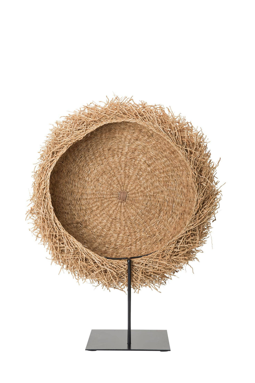 Woven basket nest on a stand against a white background