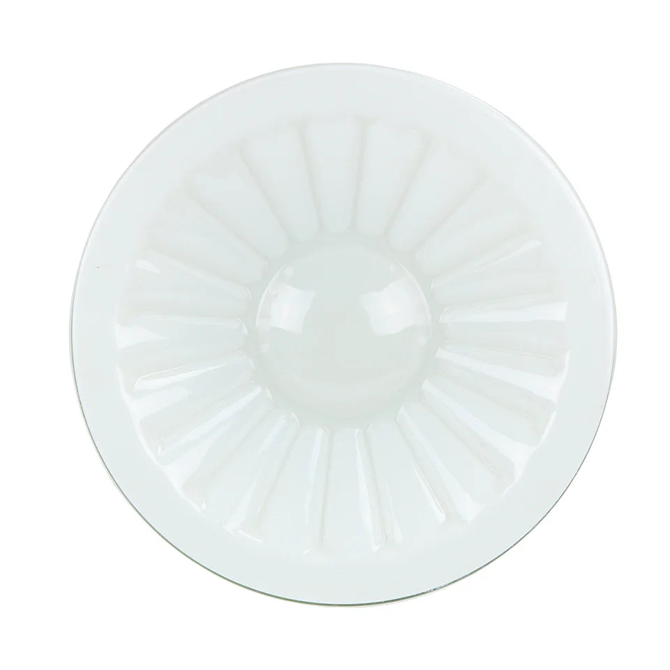 Round glass table top with a white rim on a white background