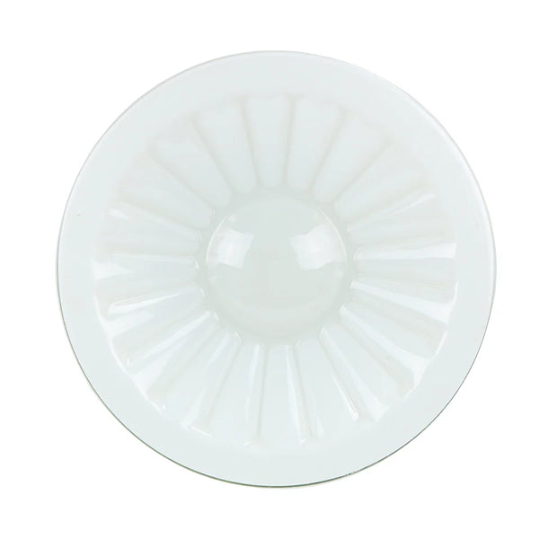 Round glass table top with a white rim on a white background