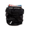 Black paper bag with a stack of magazines on a white background