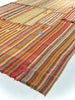 Striped fabric with multicolor pattern on a white background