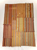 Striped fabric with a patchwork pattern on a white background