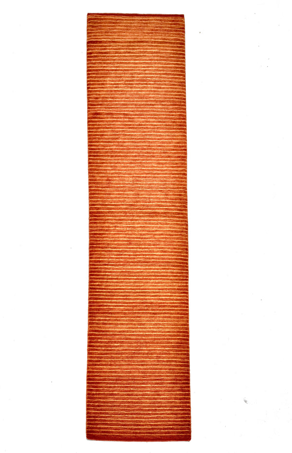 Rust-colored runner rug on a white background
