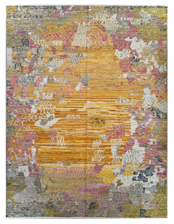 An abstract area rug with a,vintage-inspired pattern featuring a prominent golden-yellow center, surrounded by patches of dusty pink, sage green, gray, and off-white.